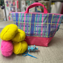 Load image into Gallery viewer, Colorful plaid bag with yarn and knitting tools on a surface