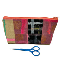 Load image into Gallery viewer, Patchwork pouch with colorful pattern and a pair of blue scissors on a white background