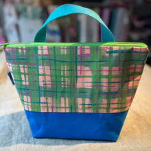 Load image into Gallery viewer, Plaid patterned bag with blue base on a surface
